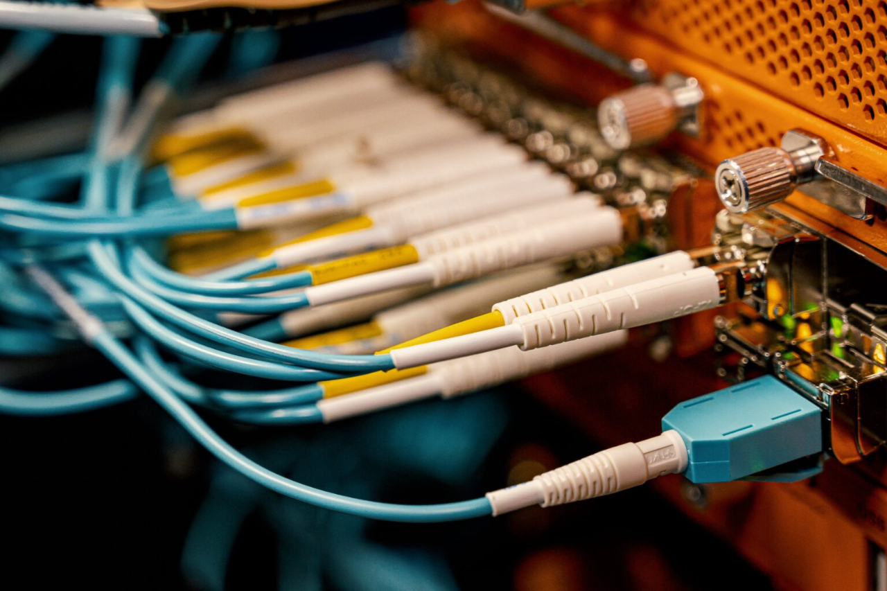 Different cable wires inserted in slots | Internet Fiber Optics